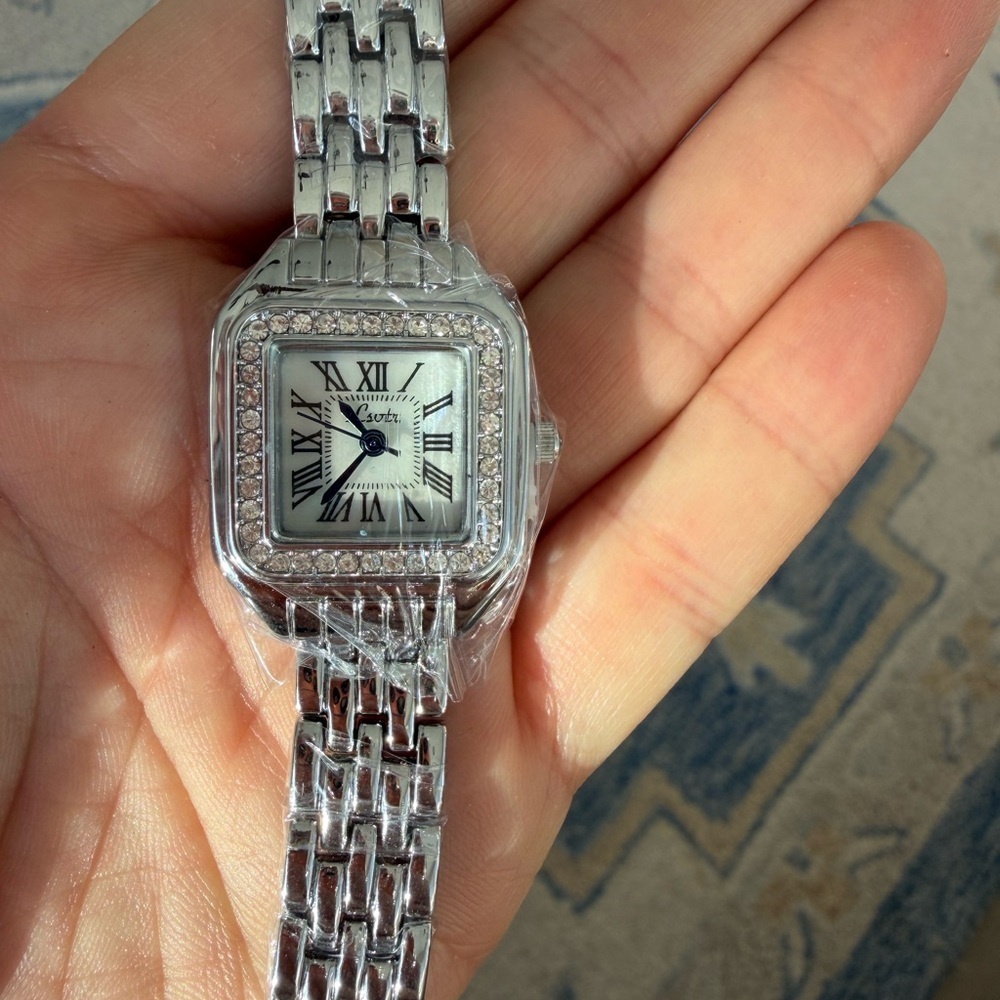 Classic Silver Stainless Steel Crystal Watch with Roman Numerals